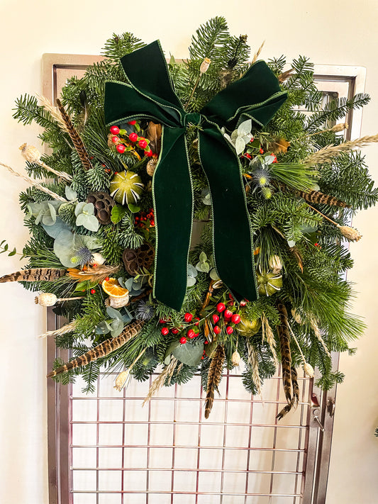 Feathers & Berries Christmas wreath with pampas grass, eucalyptus, and berries – handmade by Barns Florals.