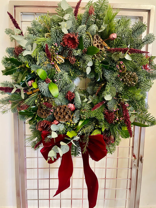 Mulled Berries & Wine Christmas wreath with spruce, eucalyptus, and cinnamon – handmade by Barns Florals.